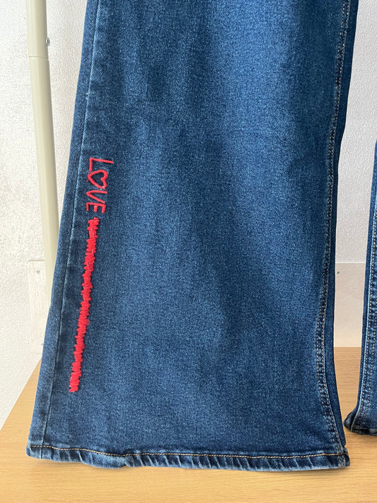 Jeans scritta Love
