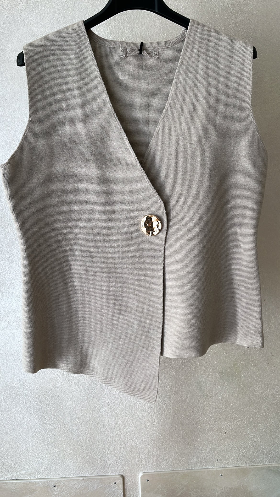 Gilet dettaglio bottone